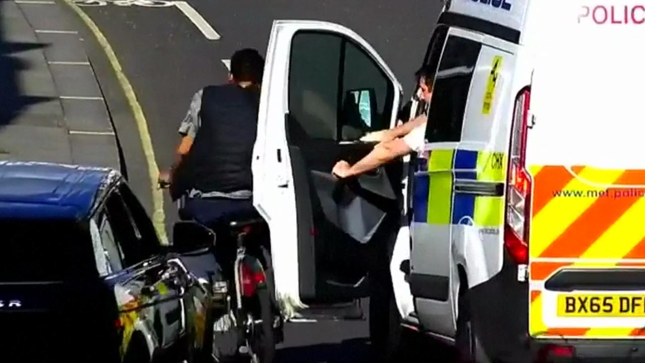 Cop uses car door to knock fleeing thief to ground