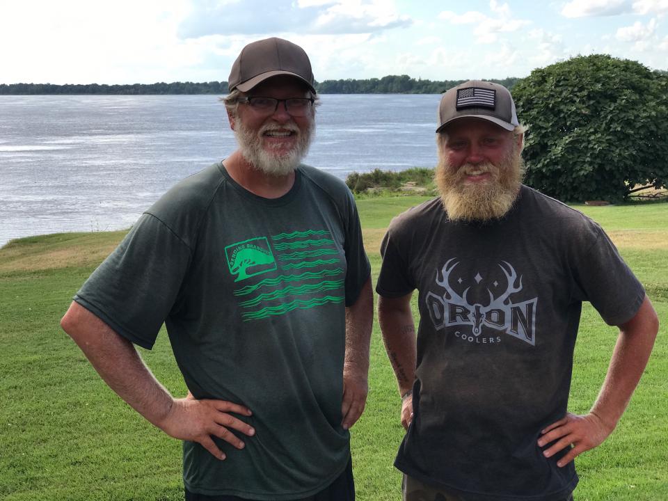 Father and son kayak Mississippi River for vets