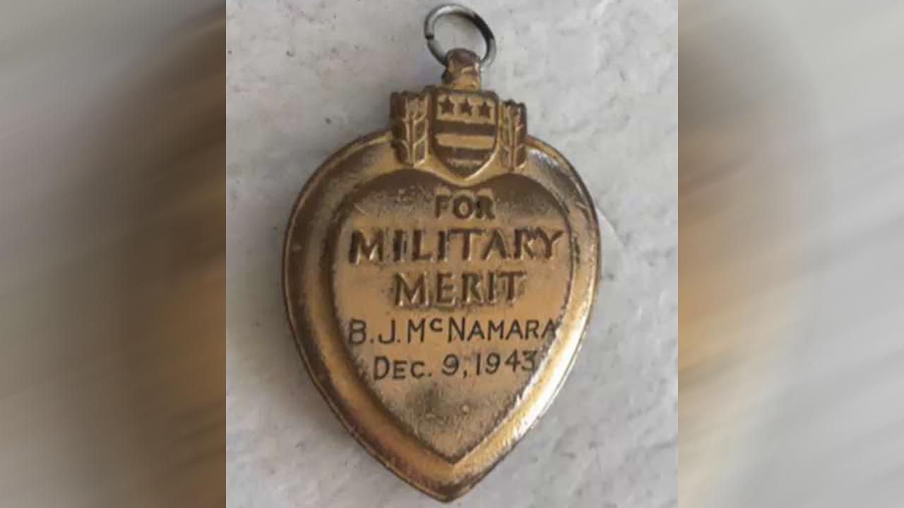 War hero's family reunited with missing Purple Heart