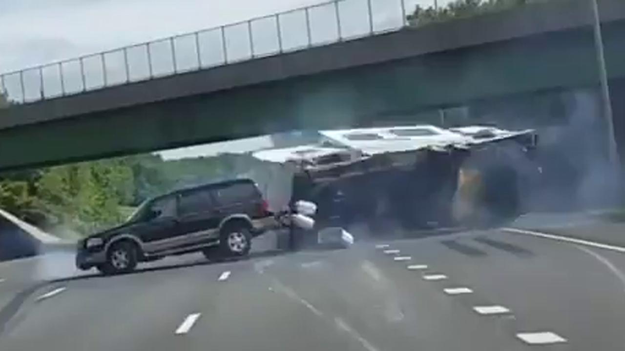Camper crash: RV swerves into traffic, flips on highway