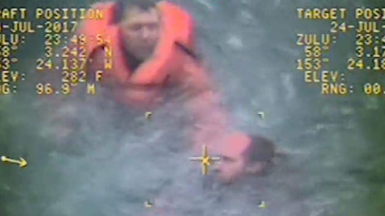 Captain jumps in water to save crewman after boat capsized