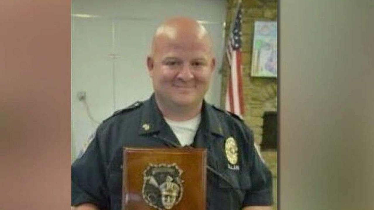 Indiana police officer gunned down responding to car crash