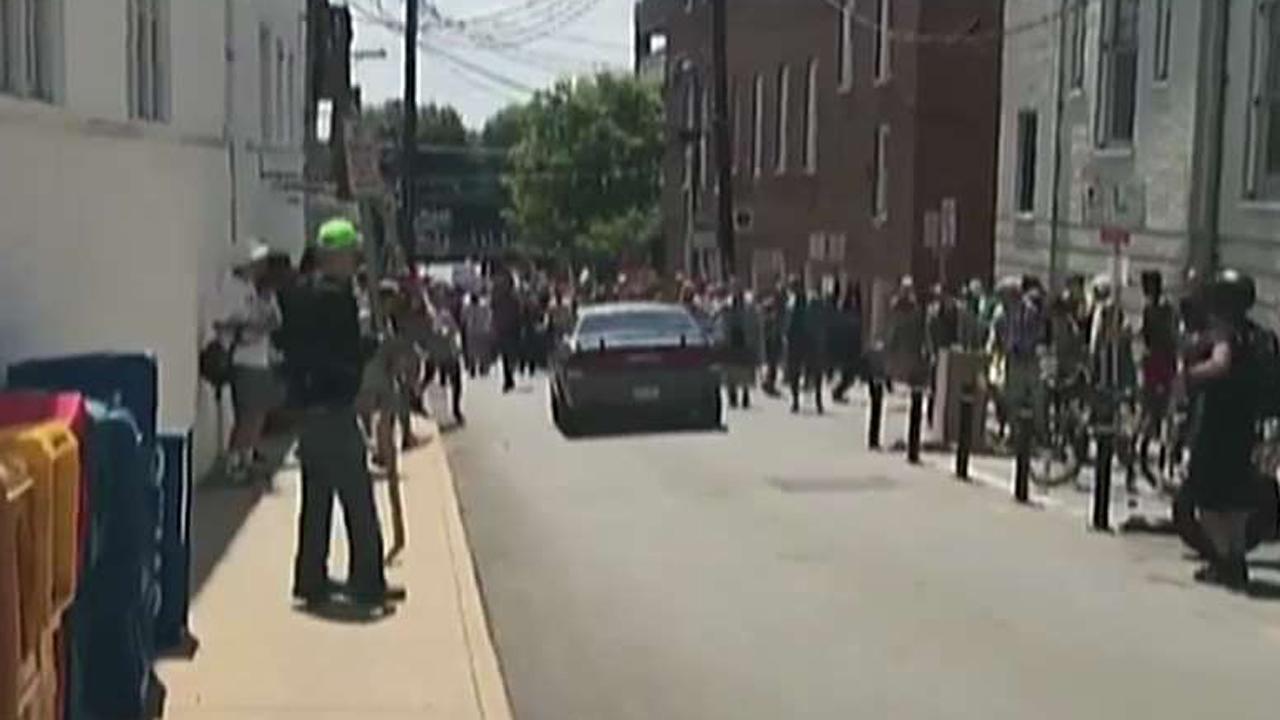 Video shows car crashing into Charlottesville protest
