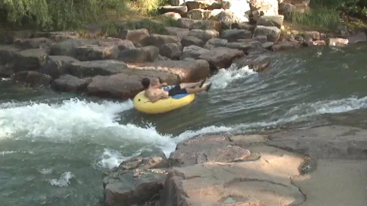 Denver woman dies trying to save son while tubing 