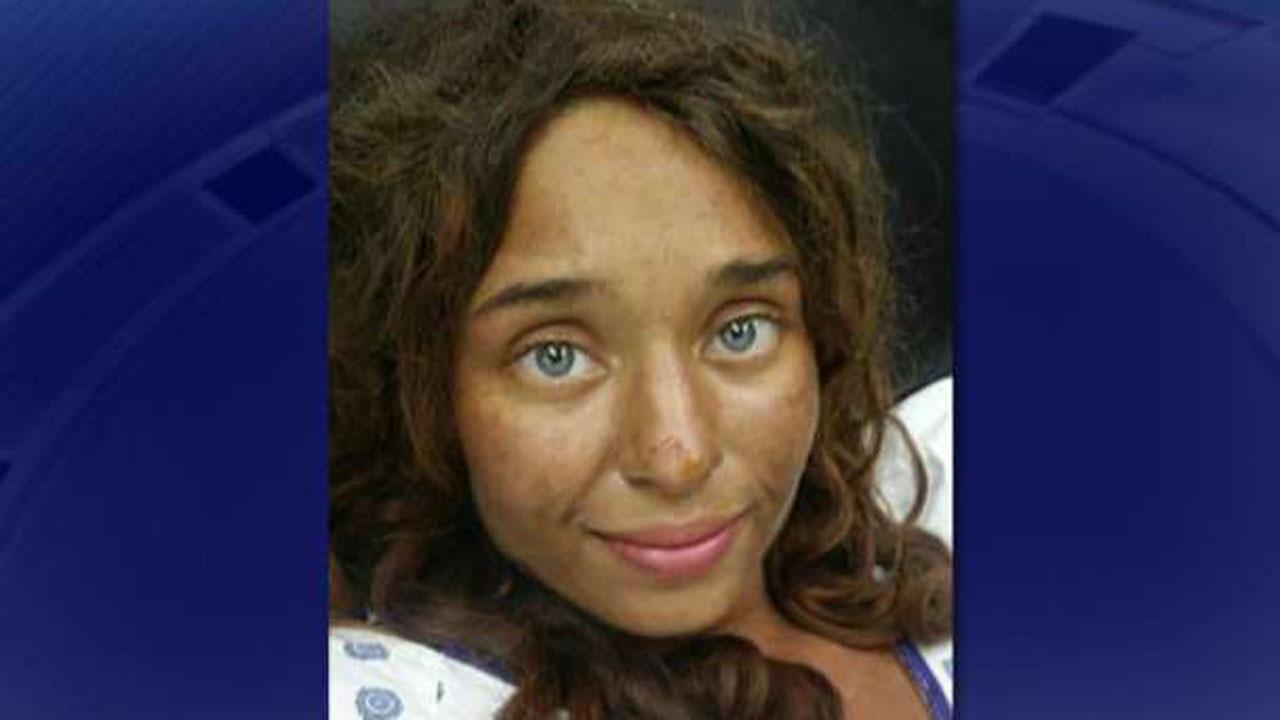 Woman missing for nearly a month found alive in woods