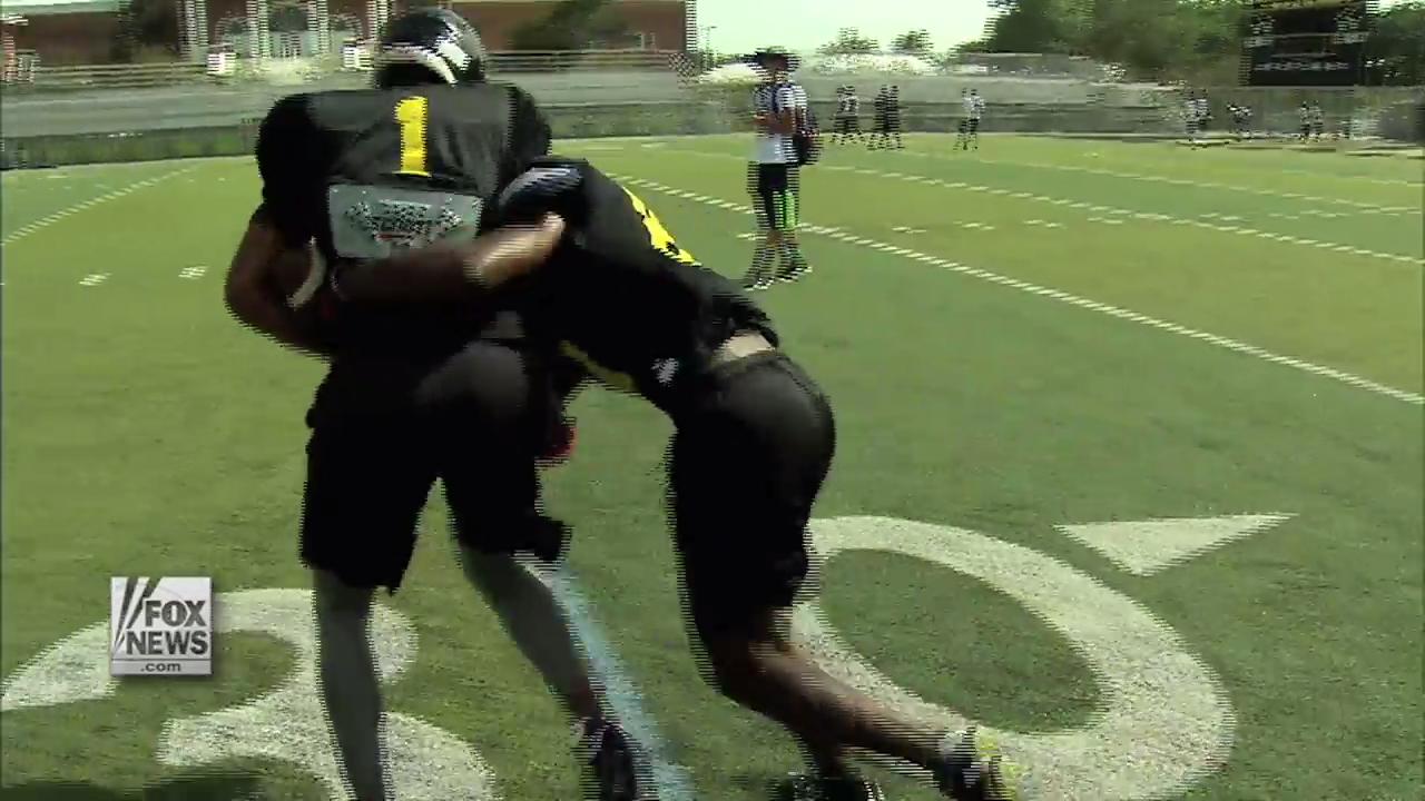Football without tackling? High school implements 'thudding'