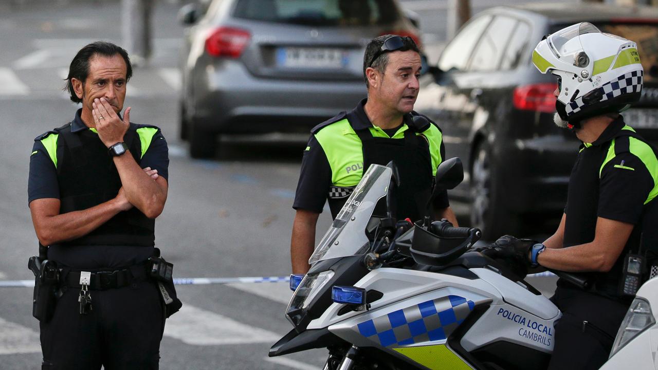Police shoot man wearing possible explosives near Barcelona