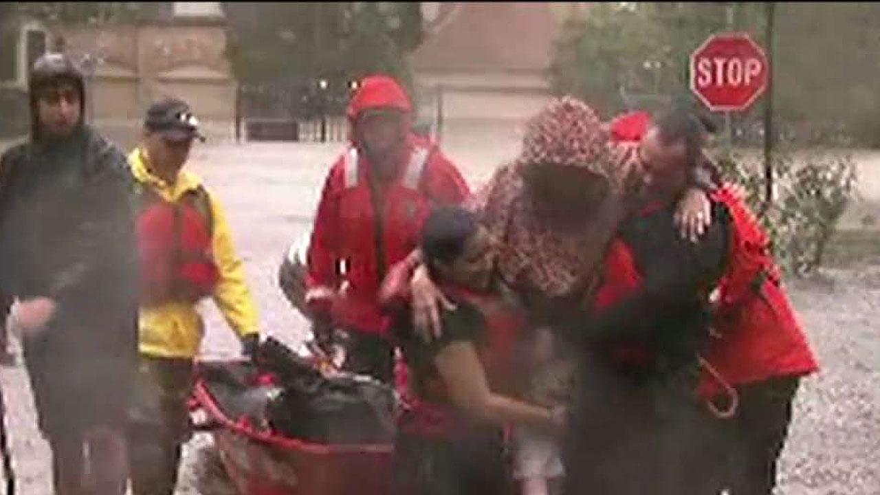 Texas family plucked to safety from flooded neighborhood