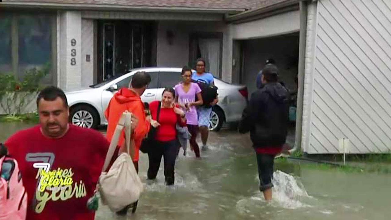 Overflow from Houston reservoir forces families to evacuate