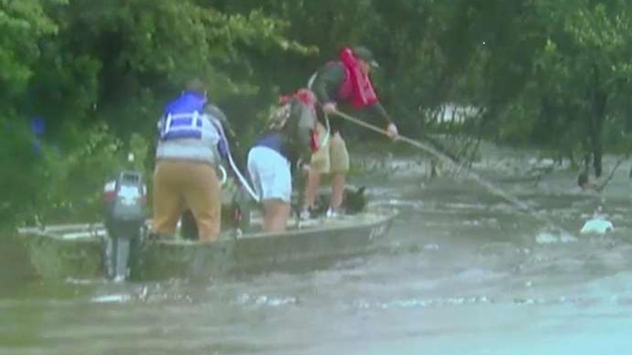 Texas man rescued by boat after clinging to tree for hours