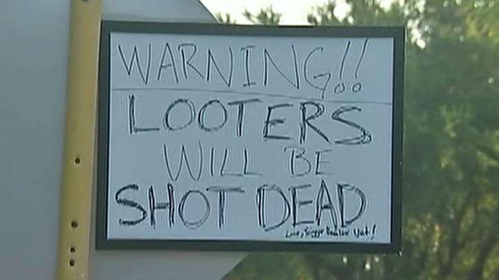 Warnings for would-be looters spotted in Houston