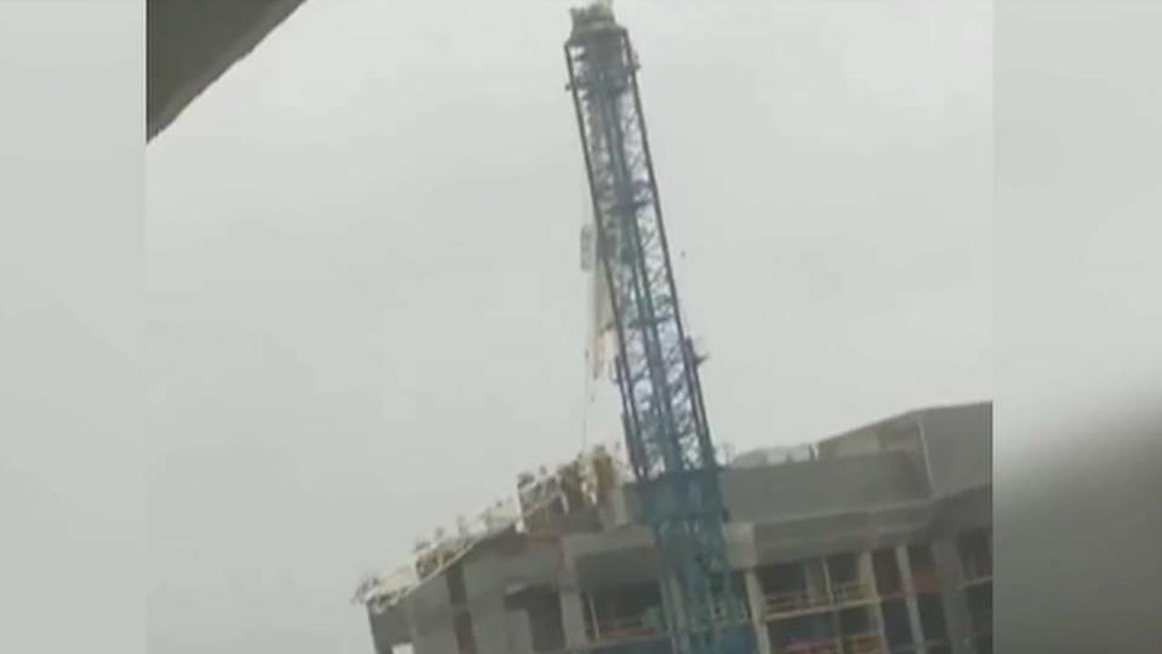 Construction crane collapses onto Miami building