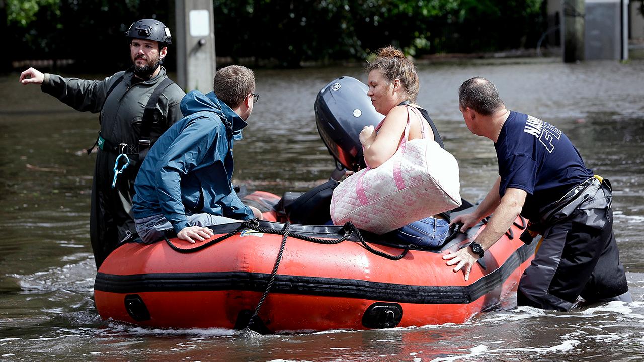 Hundreds rescued from record floodwaters in Jacksonville