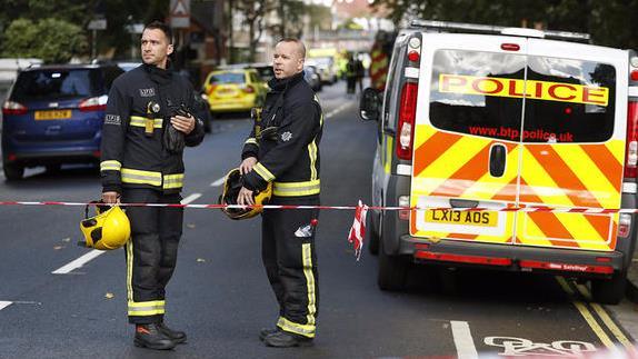 Terror attack on London train ignites manhunt