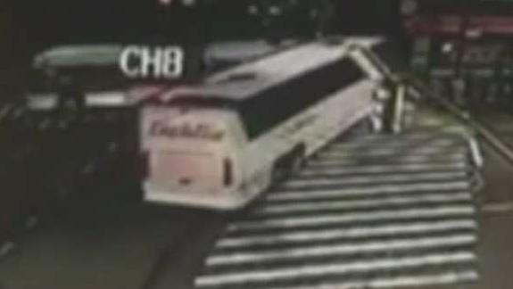 Bus plows through intersection, crashes with another bus