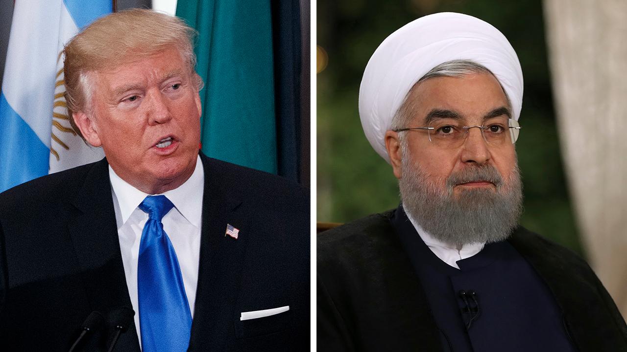 Trump teases nuke deal decision as Rouhani hits back