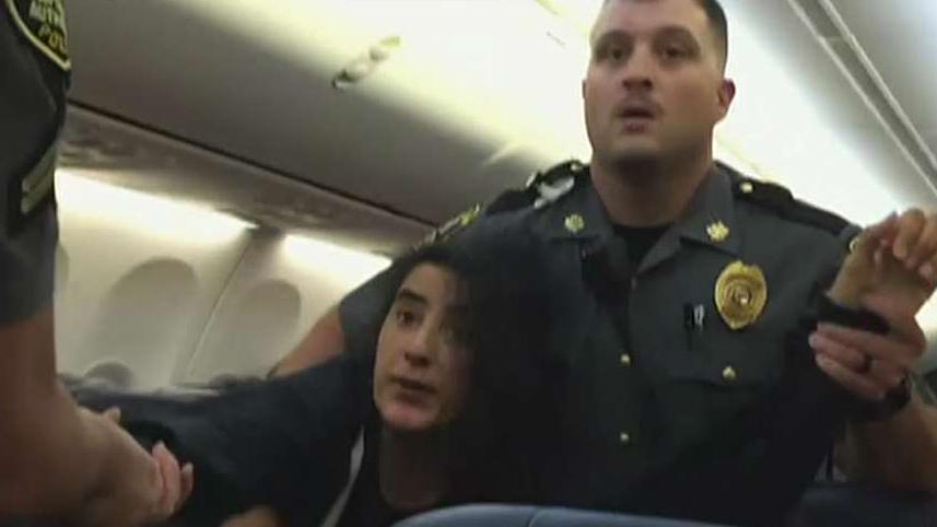 Officers drag passenger off flight over dog allergy dispute