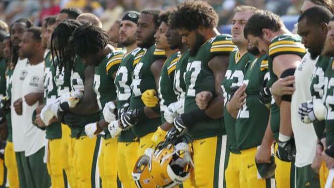 Green Bay Packers ask fans to lock arms during anthem