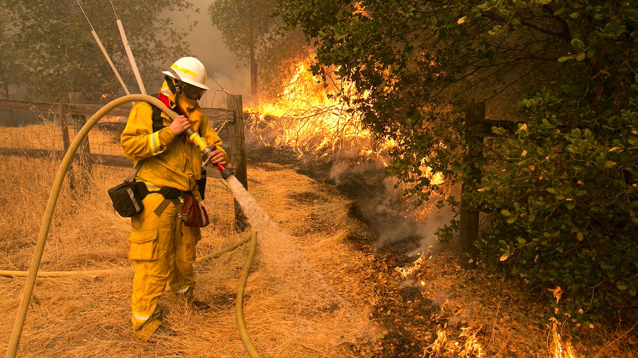 California's wine country in flames as crews battle winds