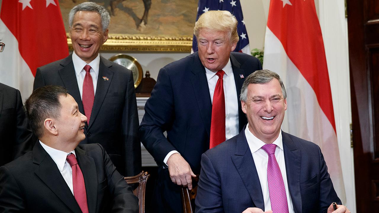 Trump celebrates Singapore-Boeing deal, awaits budget vote