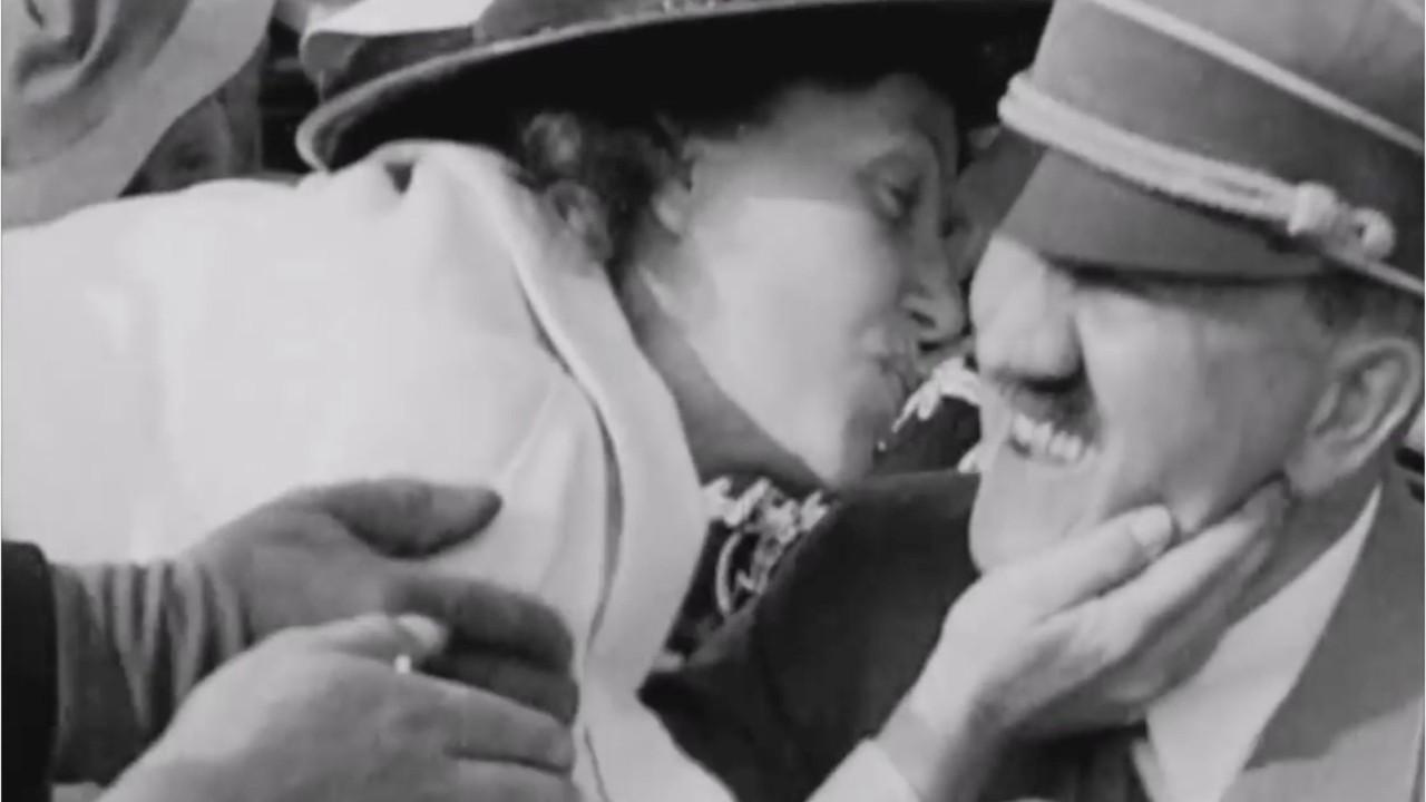 Adolf Hitler kissed by American woman in shocking video