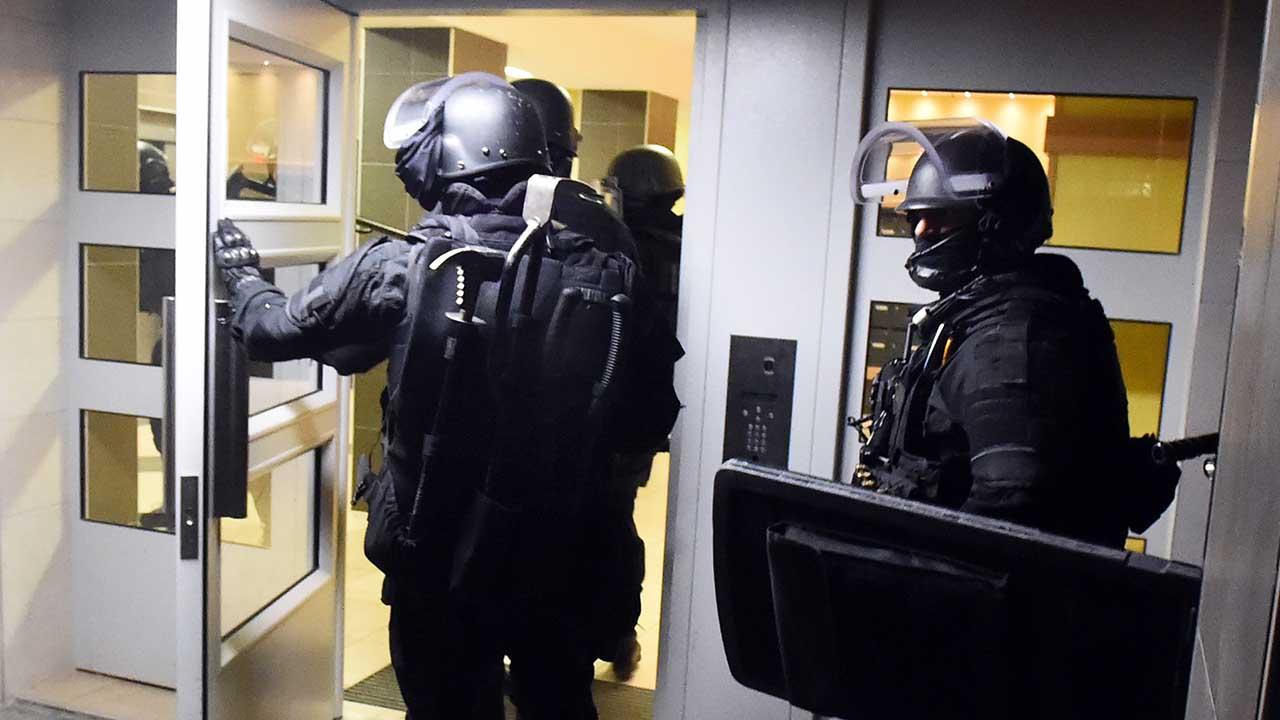 Terror raids under way outside Paris, France
