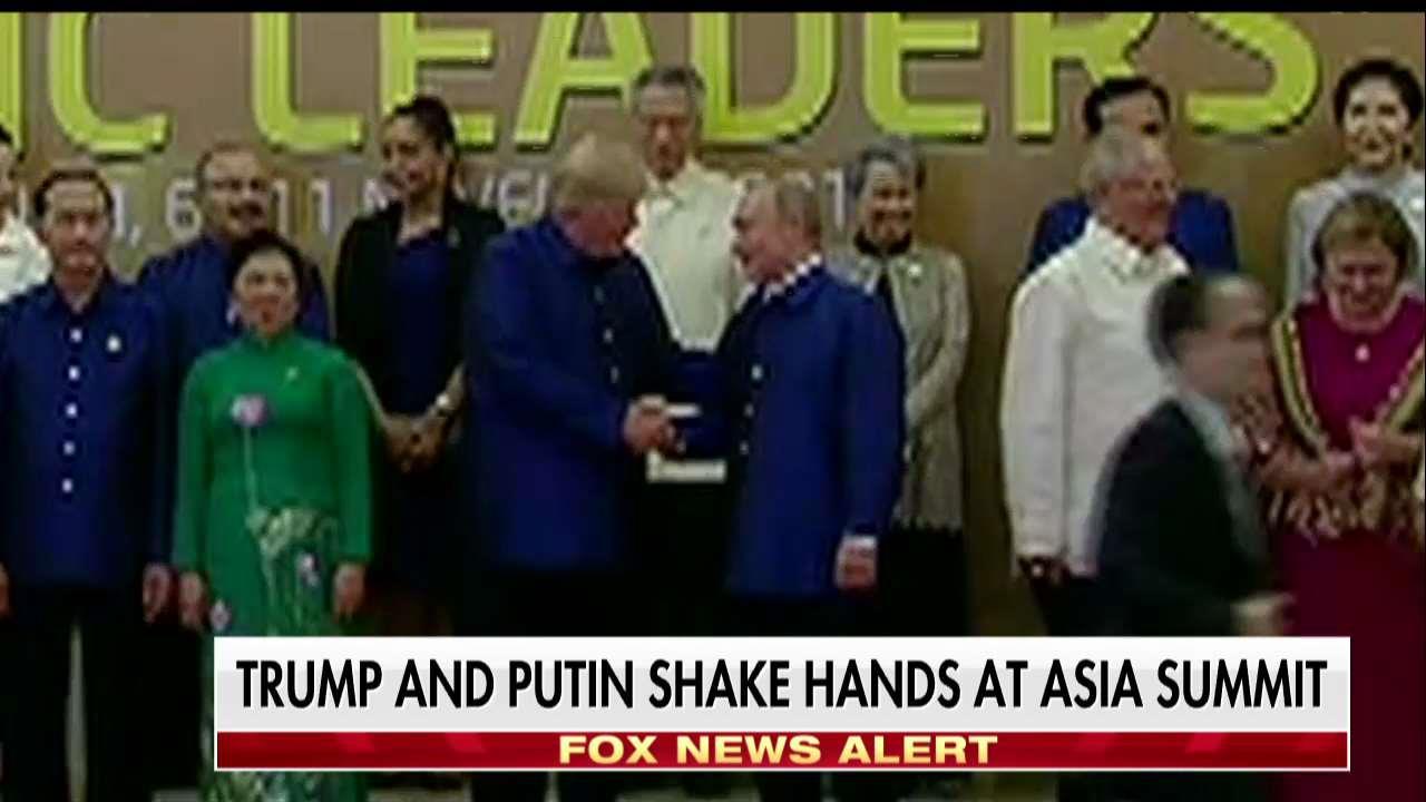 Trump & Putin shake hands at Asia summit
