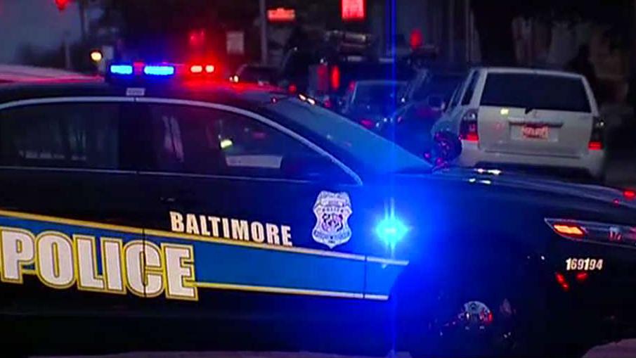 Two officers killed in separate shootings