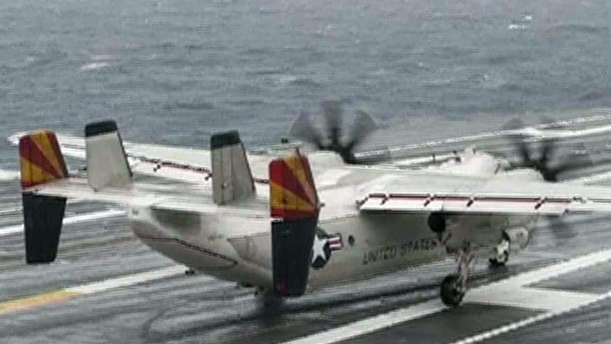Search continues for missing sailors after Navy plane crash