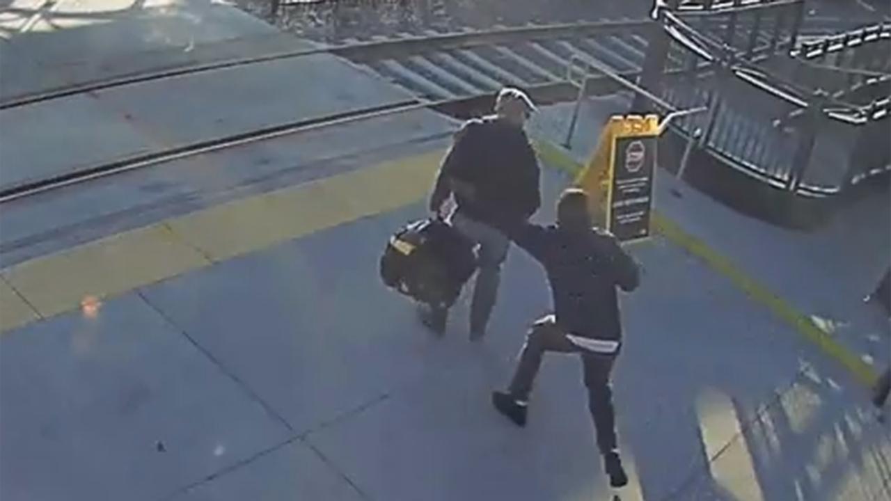 Good Samaritan stops blind man from crossing train tracks