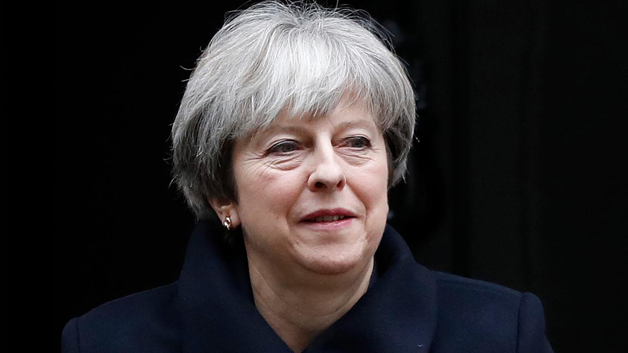 Two men accused of plotting to assassinate British PM May