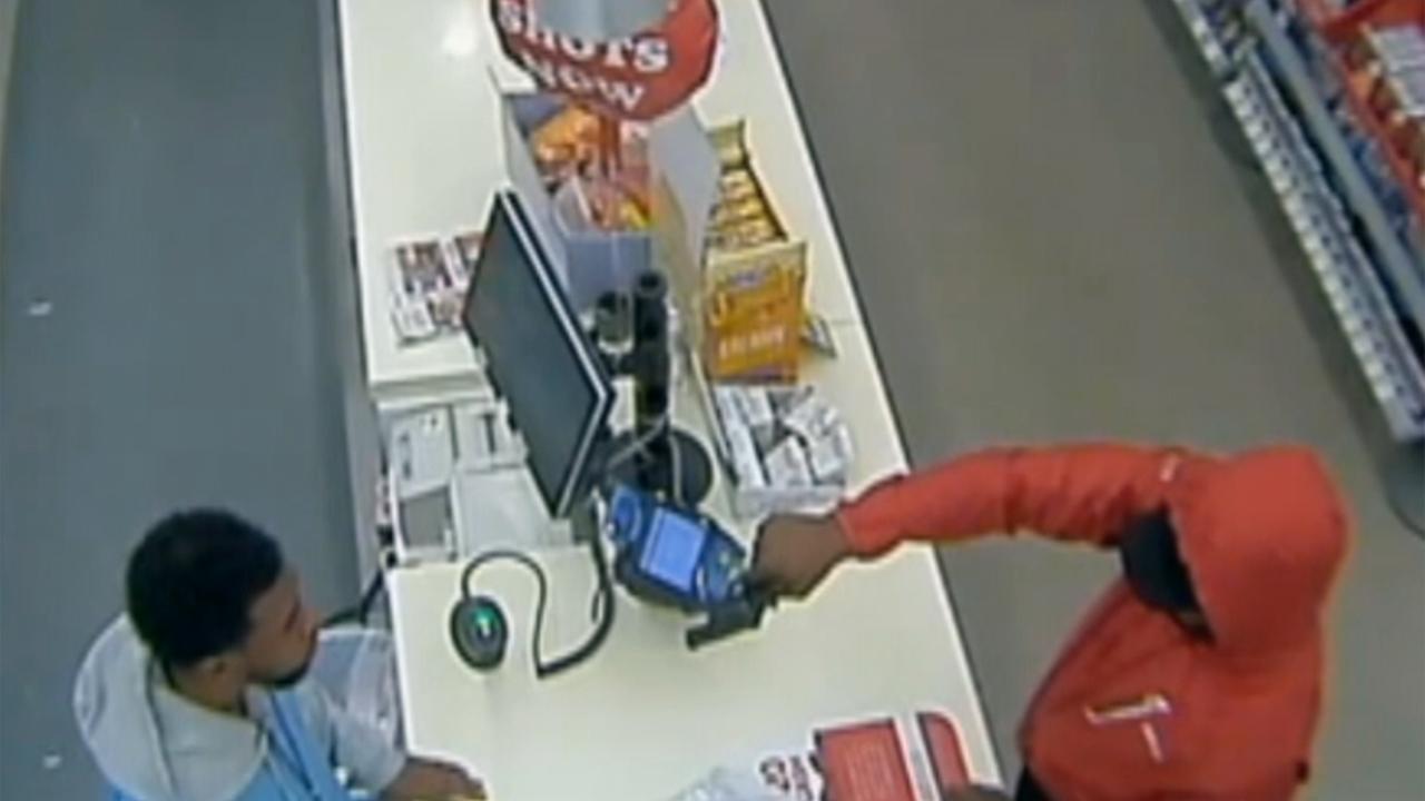 Cashier stares down armed robber