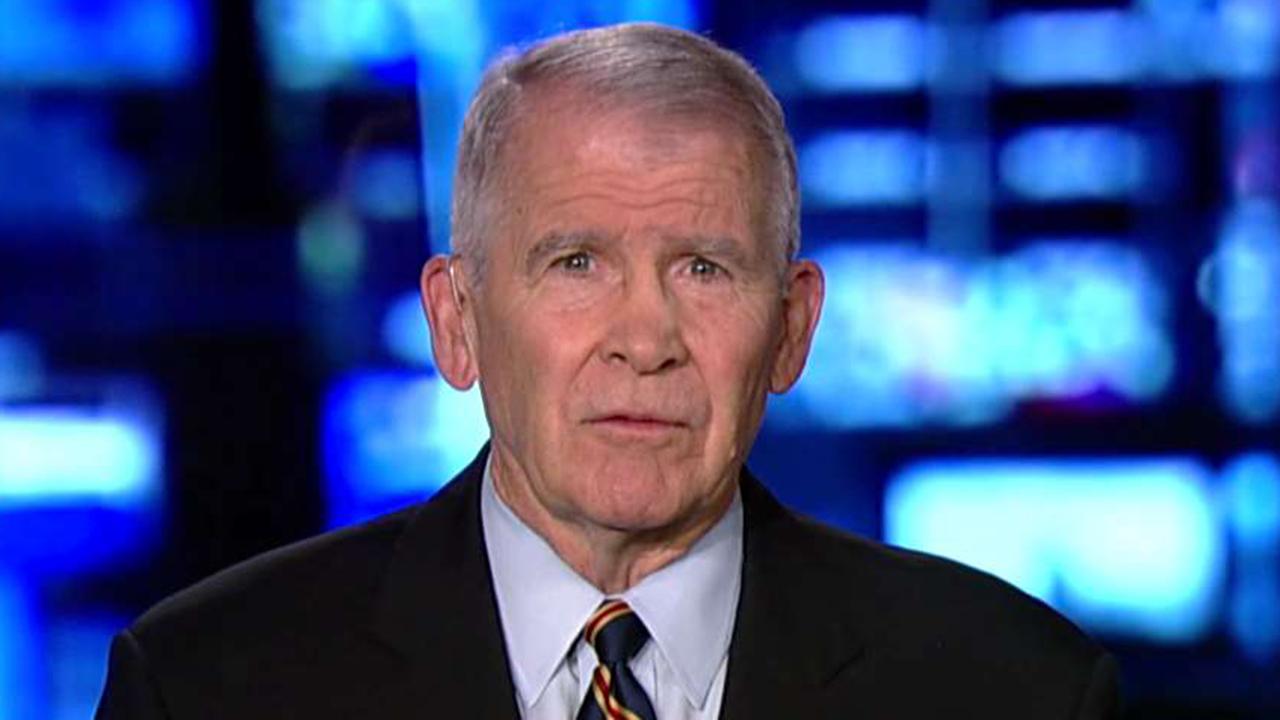 Oliver North reacts after Iraq declares victory over ISIS
