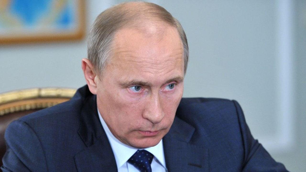Putin visits Syria, announces partial troop withdrawal