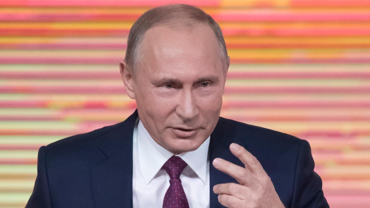 Putin denies election meddling at year-end news conference