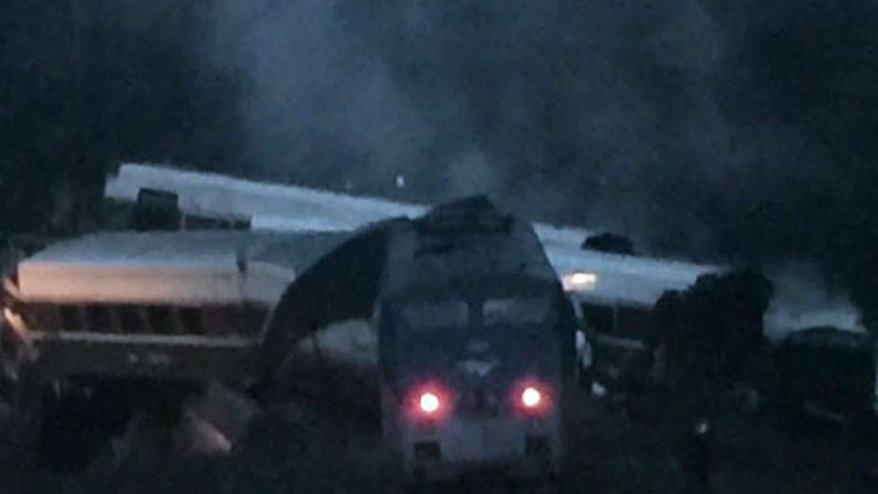 Official: Amtrak engineer in crash may have been distracted