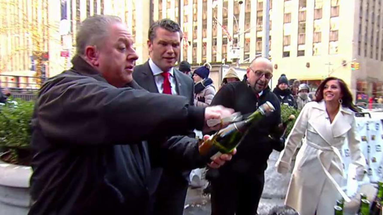 Man attempts to break champagne bottle sabering record