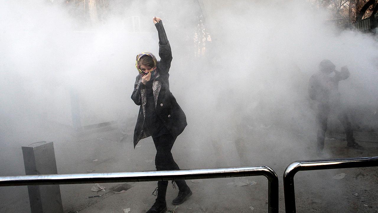Violent protests in Iran spread to more cities
