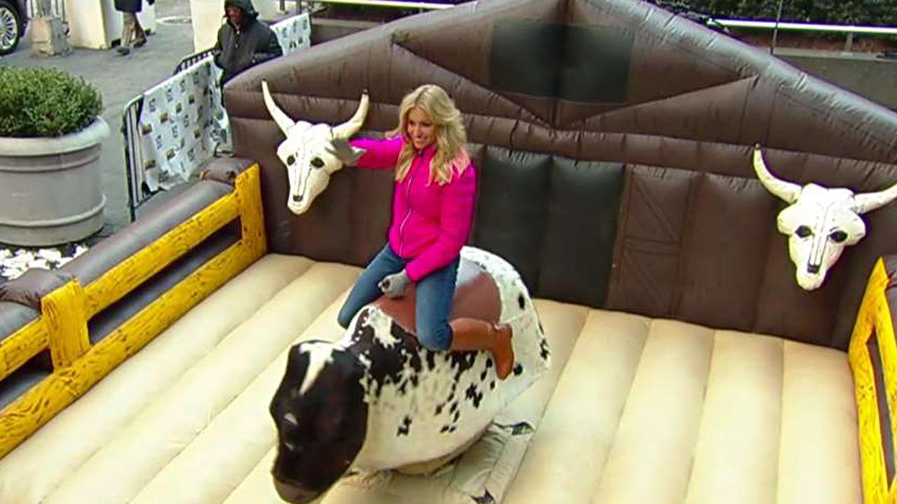 'Fox & Friends' hosts face mechanical bull on the plaza