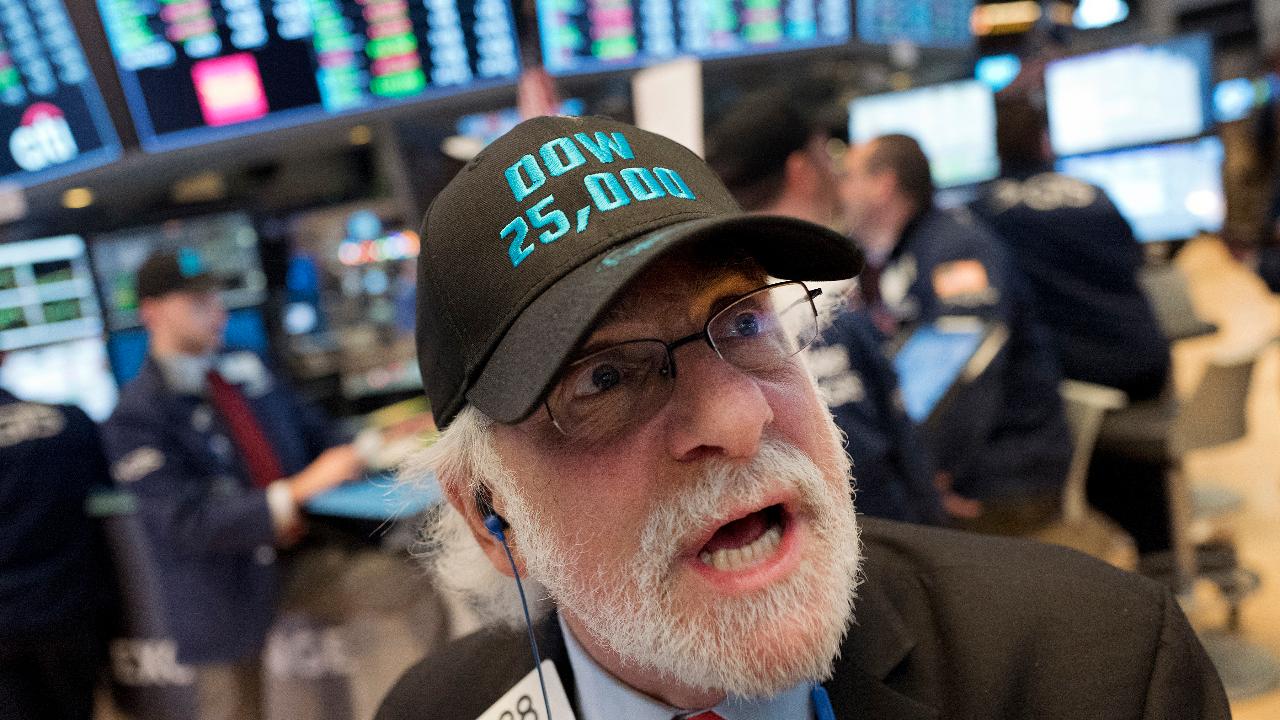 Stock market jumps past 25,000 for the first time