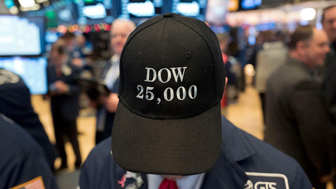 Media coverage of Trump in focus as Dow breaks records