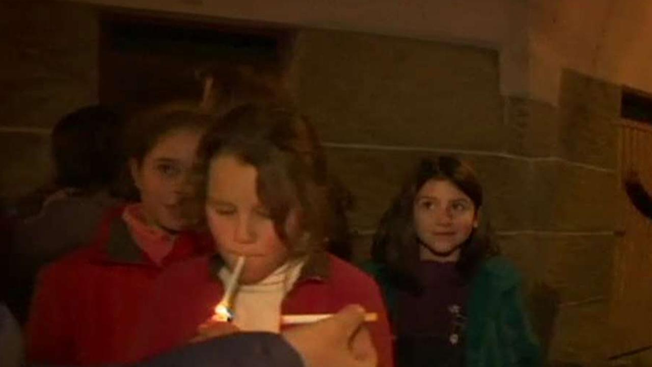 Children encouraged to smoke cigarettes at festival