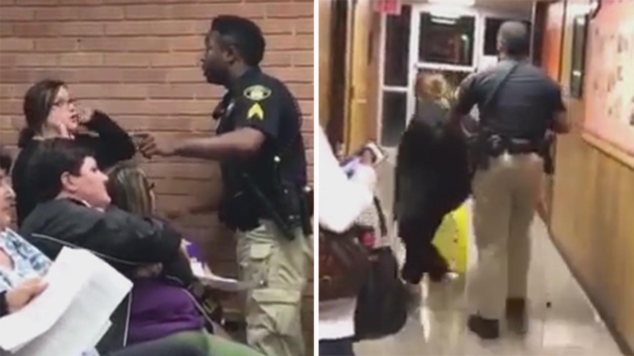 Teacher forcibly removed, arrested at school board meeting