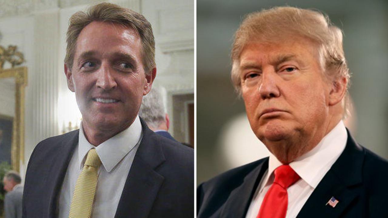 Flake compares Trump's media attacks to Stalin in interview