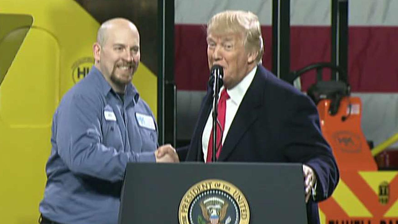 Pa. worker reacts to being brought onstage by Trump