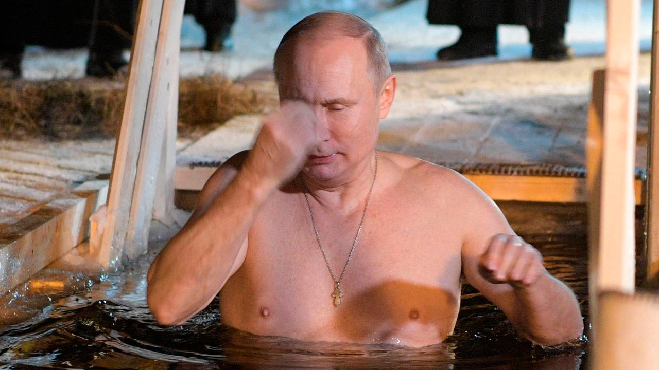 Putin celebrates Epiphany with shirtless dip in icy lake