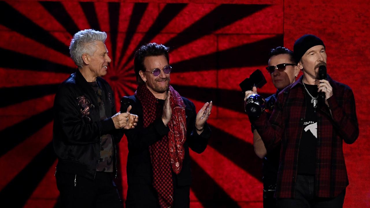 U2 releases music video with KKK marching on the White House