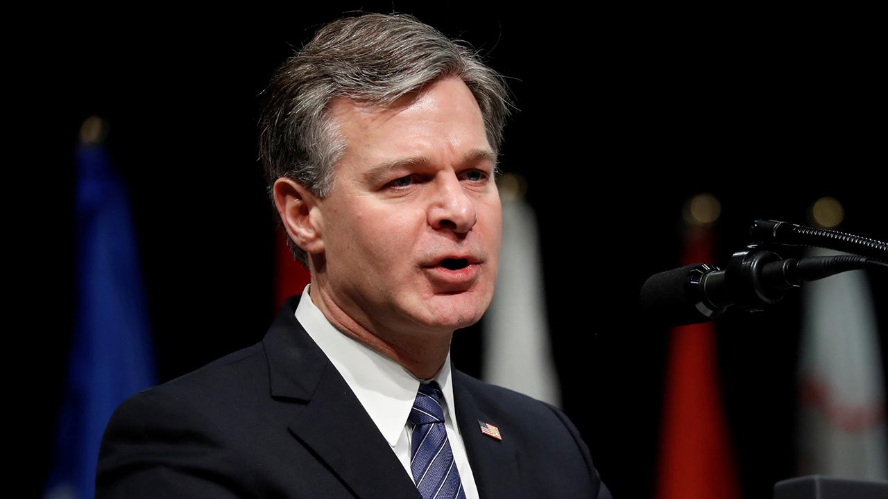 Axios stands by report that FBI's Wray threatened to resign