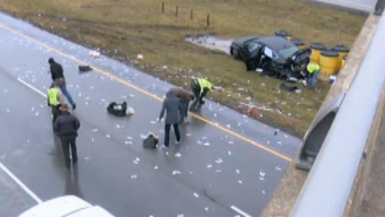 Cash scattered all over Illinois highway after crash