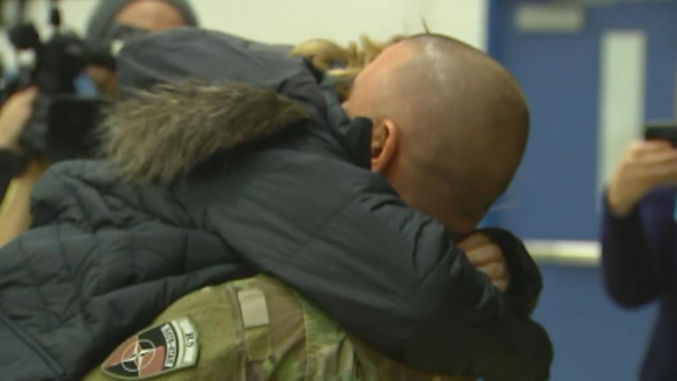 Solider surprises 9-year-old daughter at school